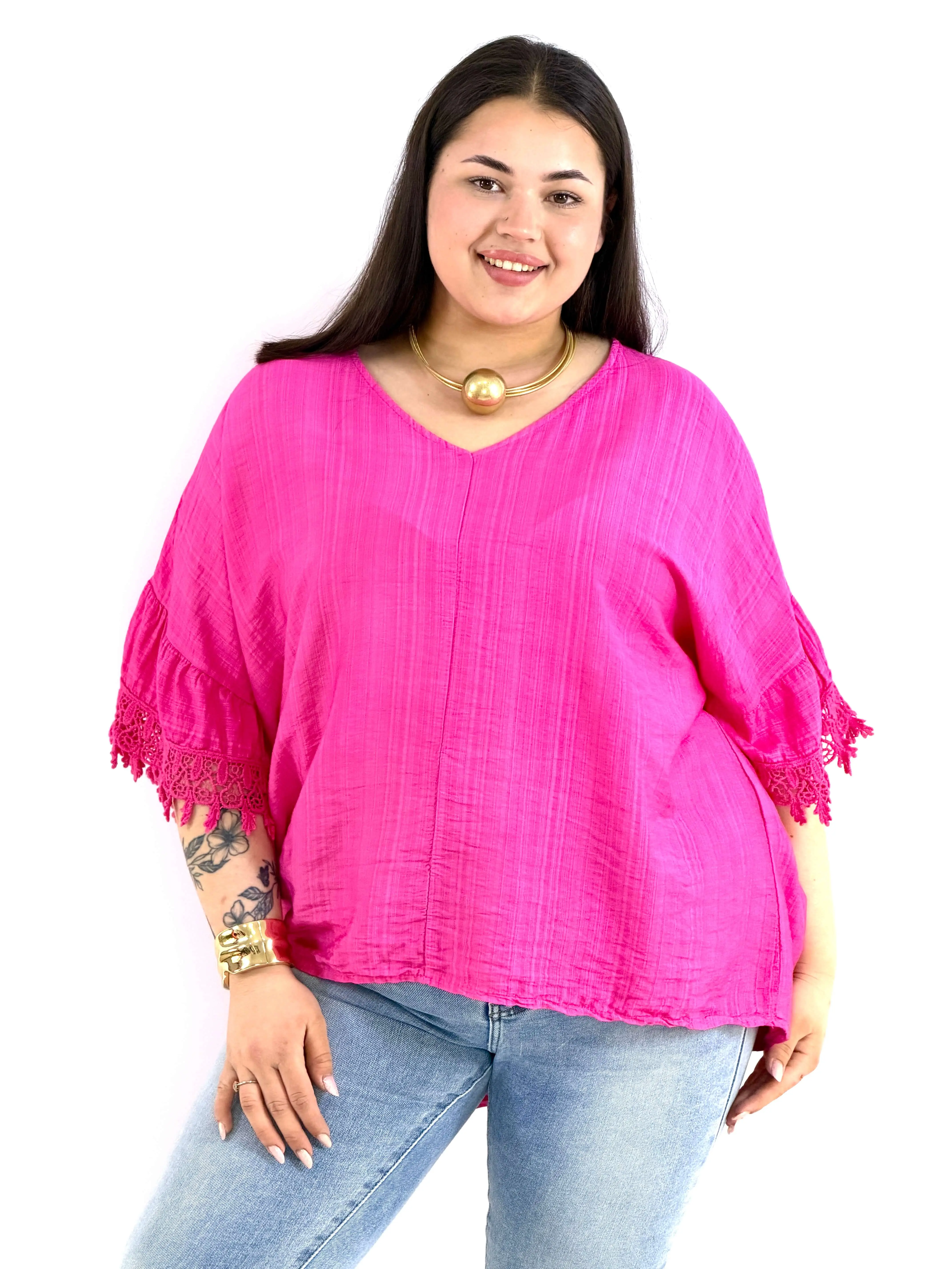 Bluzka plus size oversize z koronkowym rękawem – lekka i stylowa