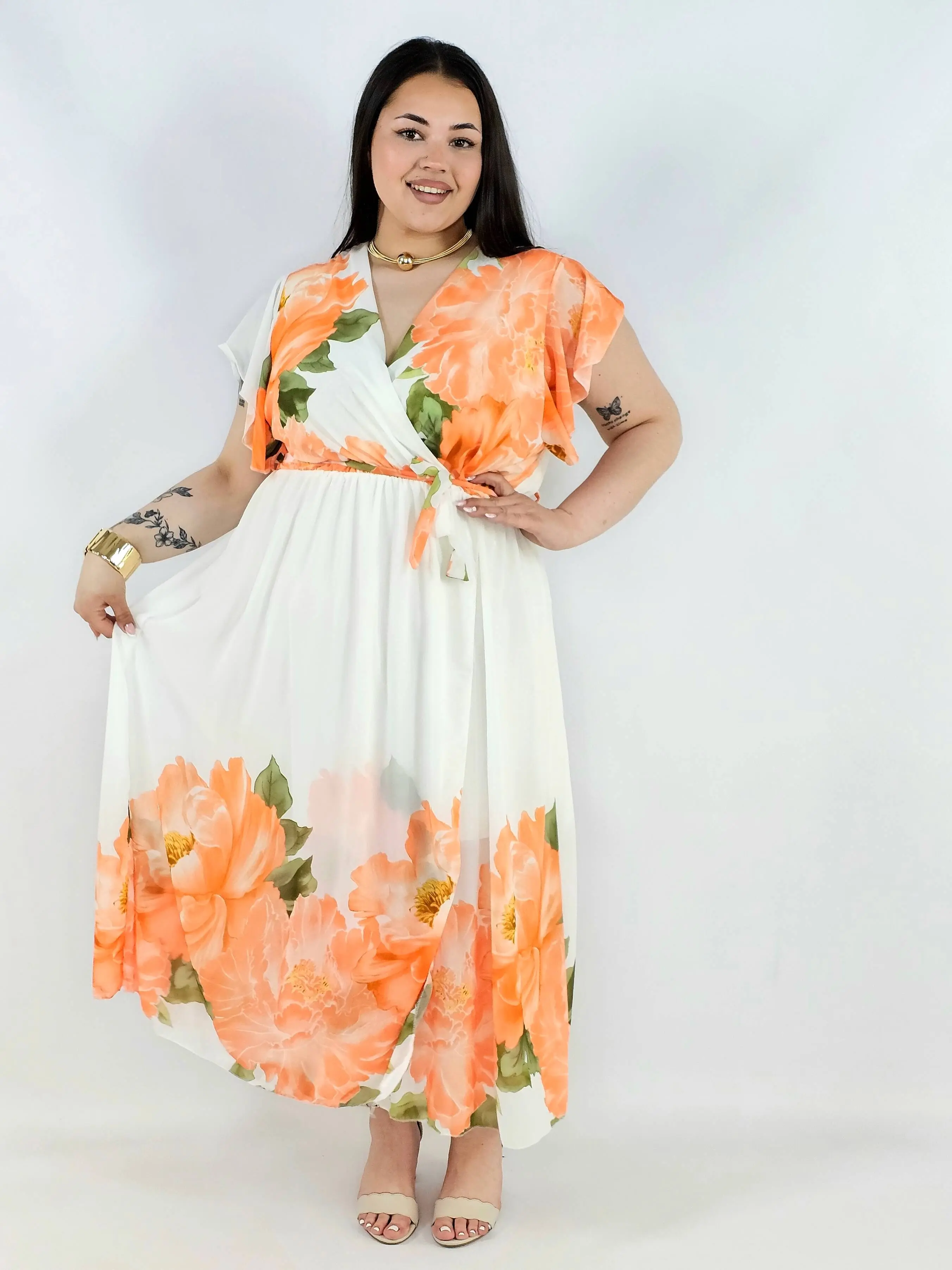 Sukienka plus size kopertowa XXL – elegancka i zwiewna propozycja na komunię i wesele